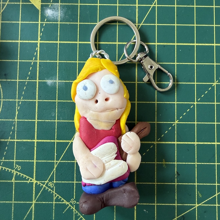 Pink Guitar Player Keyring (Free P&P UK only)